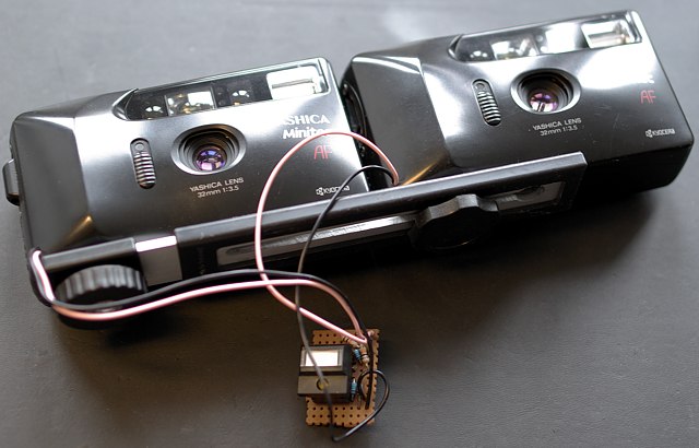 dual Yashicas with exposed electronics